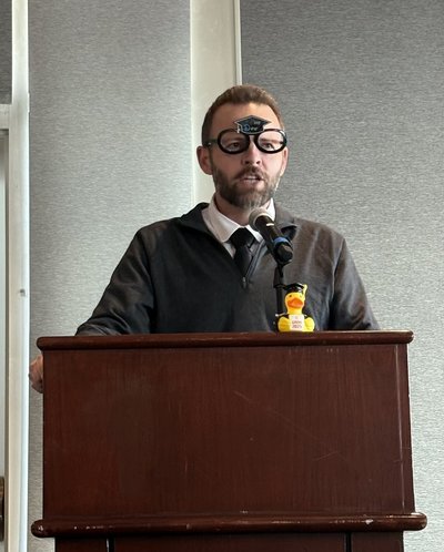 Brian speaking at graduate ceremony